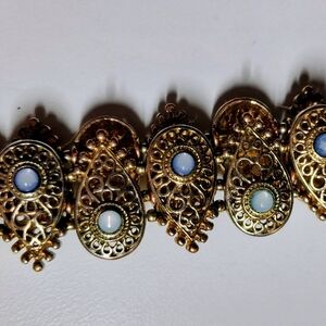 Gold-Tone Filigree Teardrop Bracelet with Opalescent Cabochons